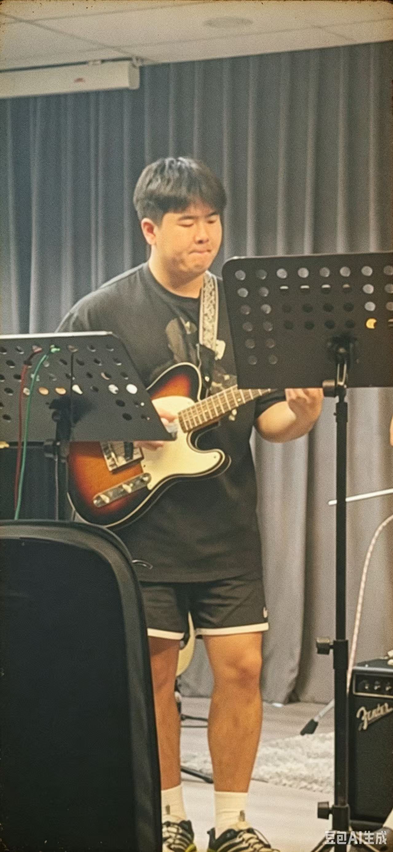 Zhang Zhebin performing electric guitar live